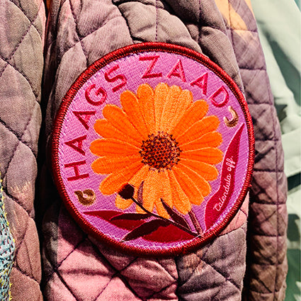 Haags Zaad geborduurde patch Calendula